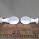 Pair of wall lights from the 1950s in porcelain.