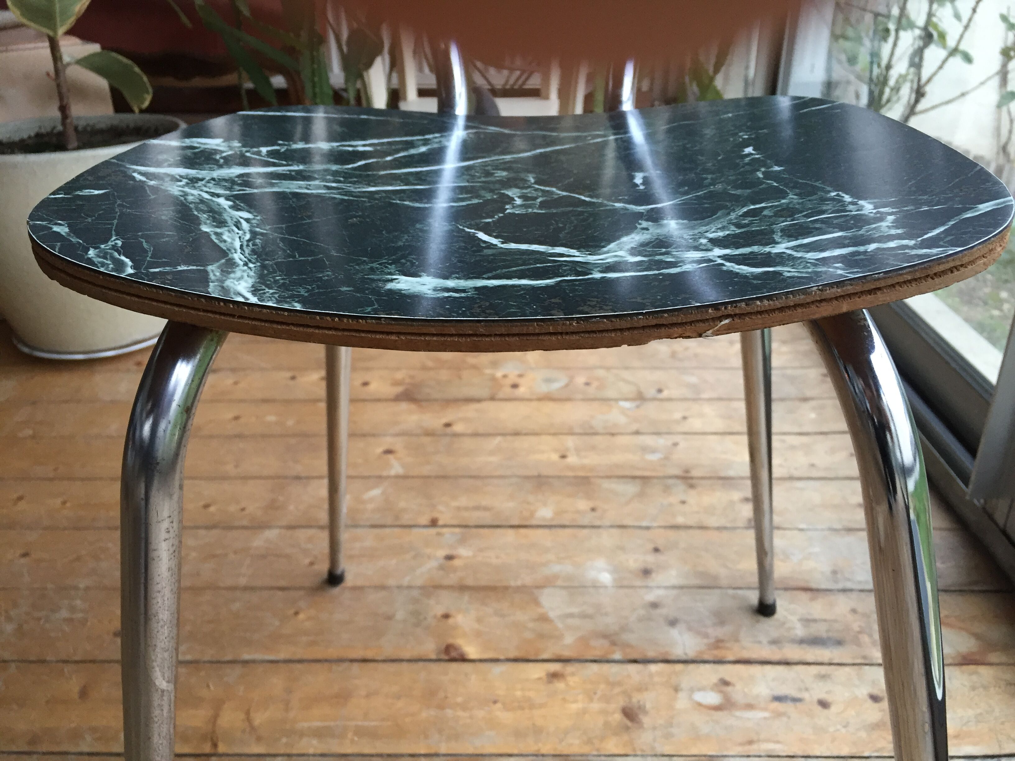 4 chairs in very dark green formica marble effect