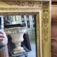 GOLDEN WOODEN MIRROR WITH PALMETTES FROM THE 19TH CENTURY