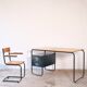 Desk with bauhaus style tubular steel chair