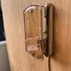 Brass wall lamp and smoked glass