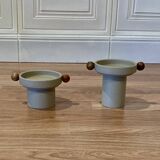 A pair of Scandinavian design candle holders.