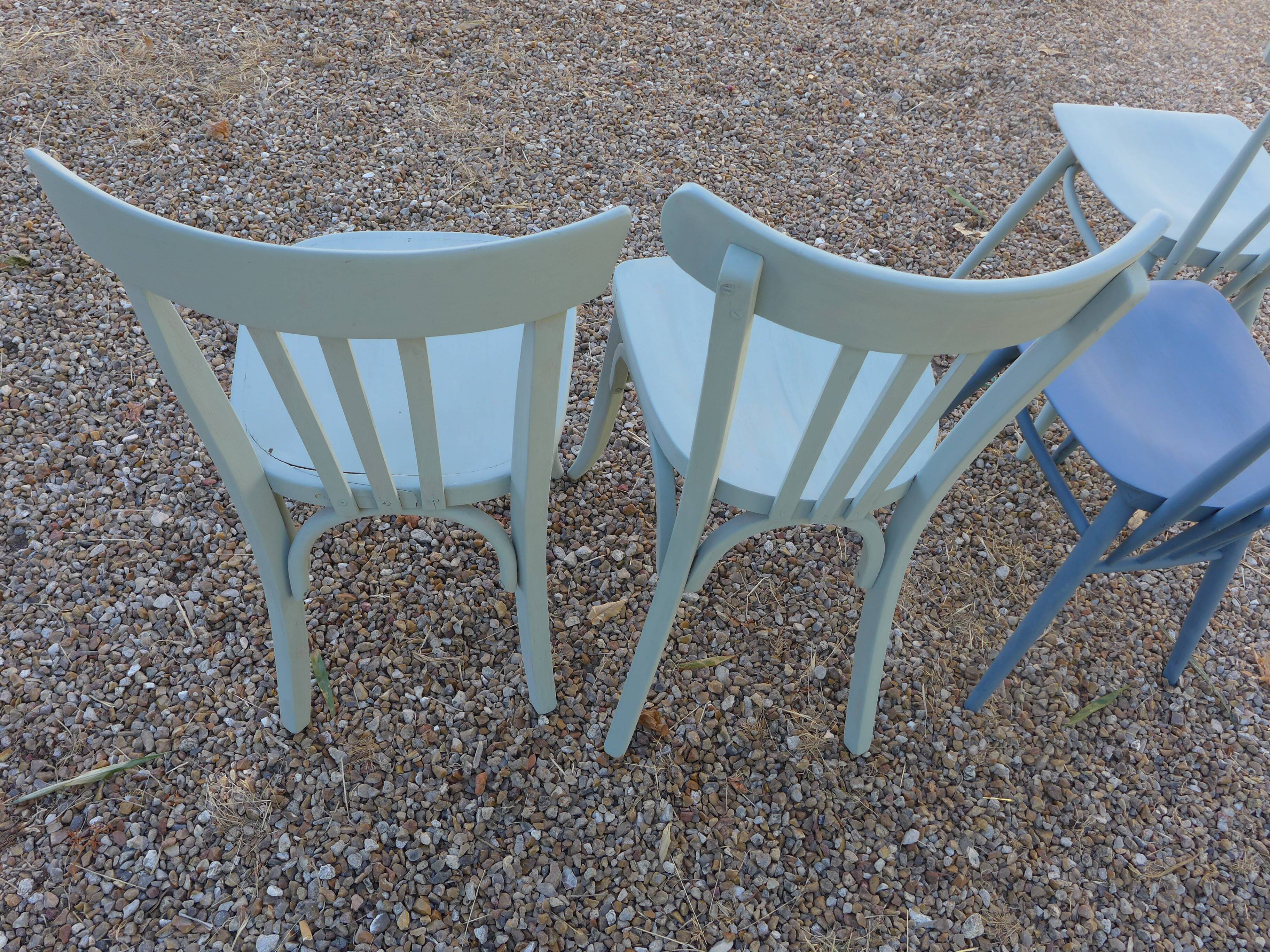 Set of 4 mismatched blue chairs