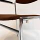 Set of 6 stackable chairs in rust colour by Gijs van der Sluis, 1970s.