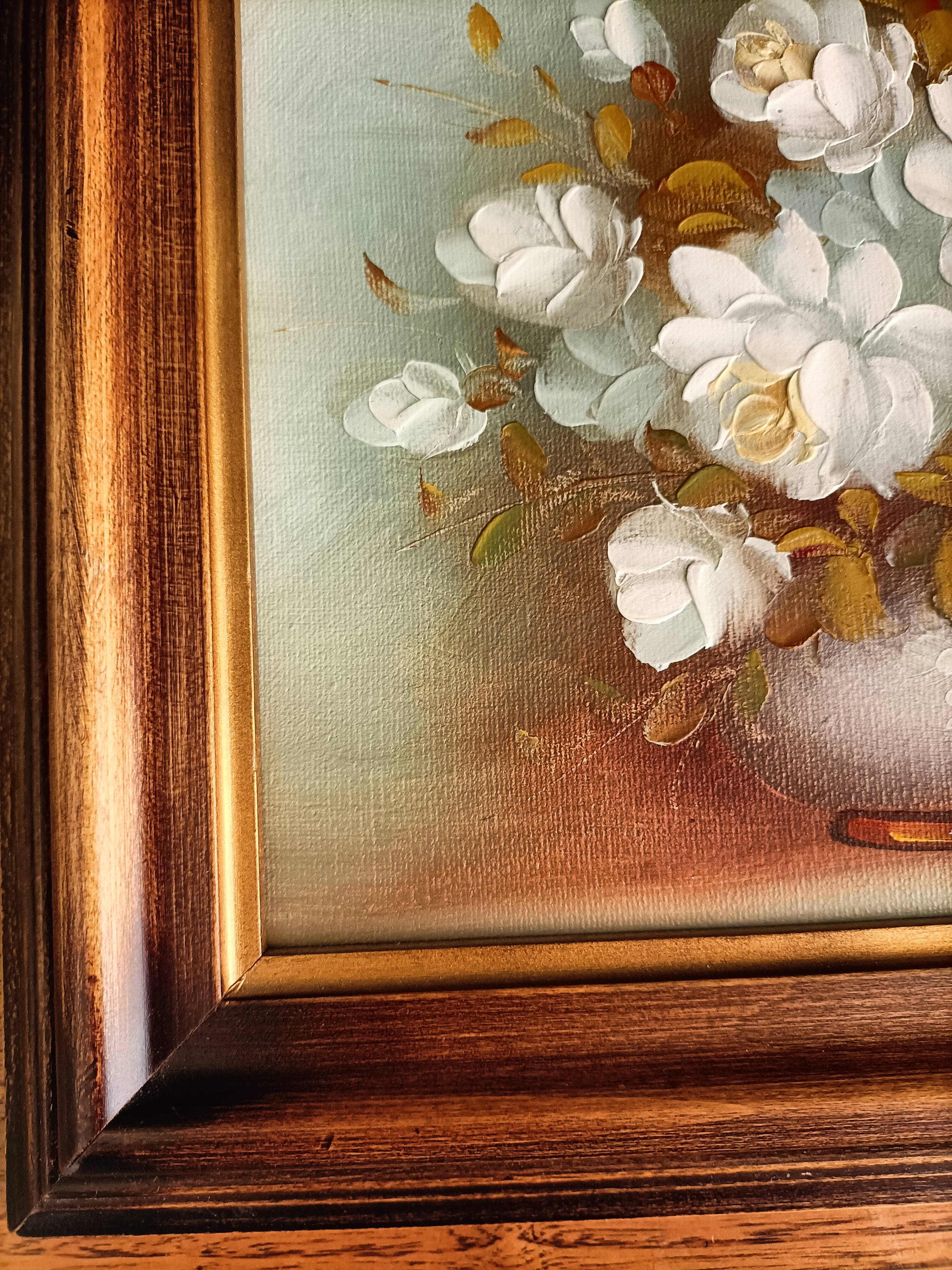 Still life painting with flowers, artist's signature