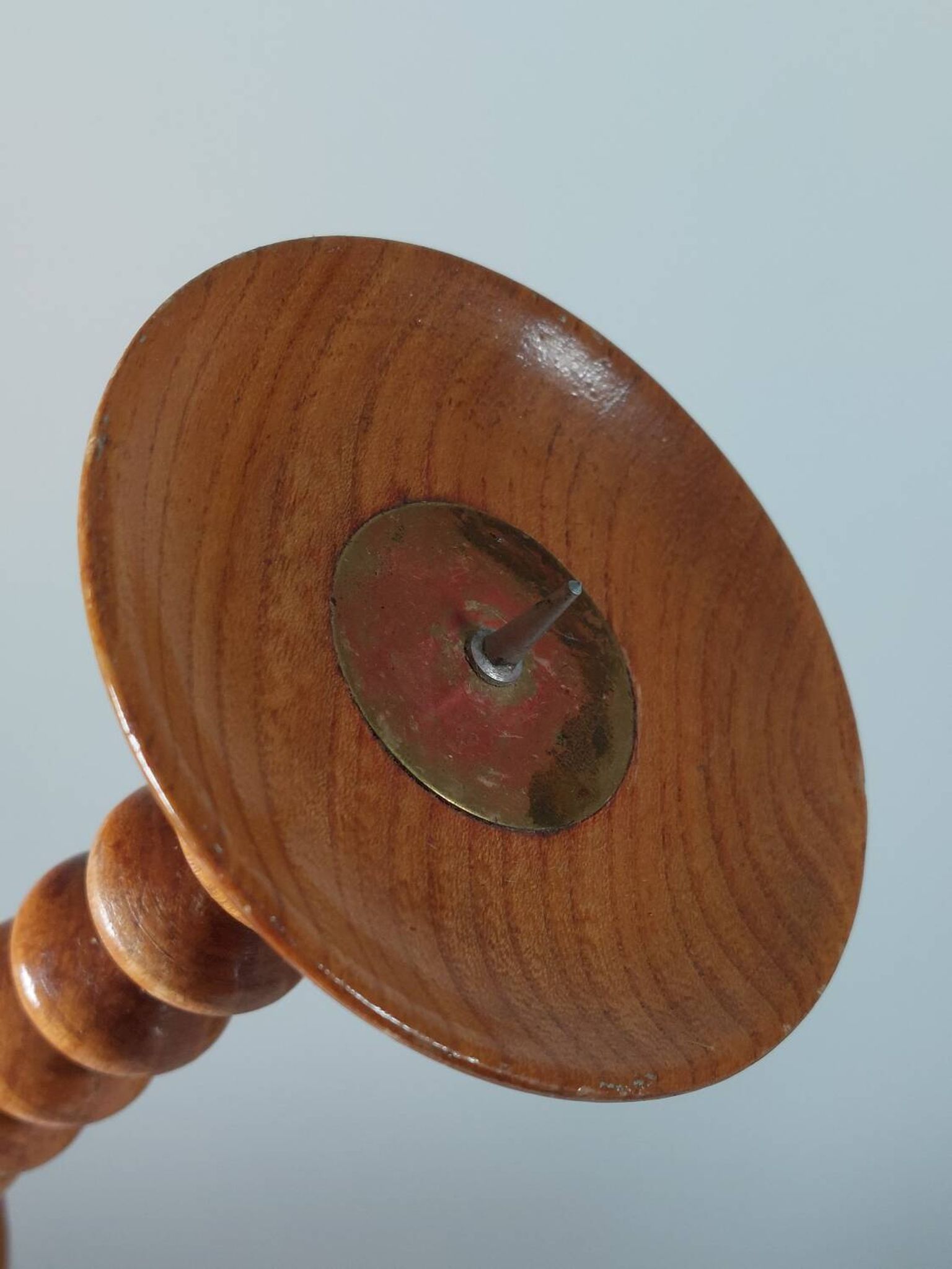Vintage mid-century wooden candlestick, spool decoration from the 1970s.
