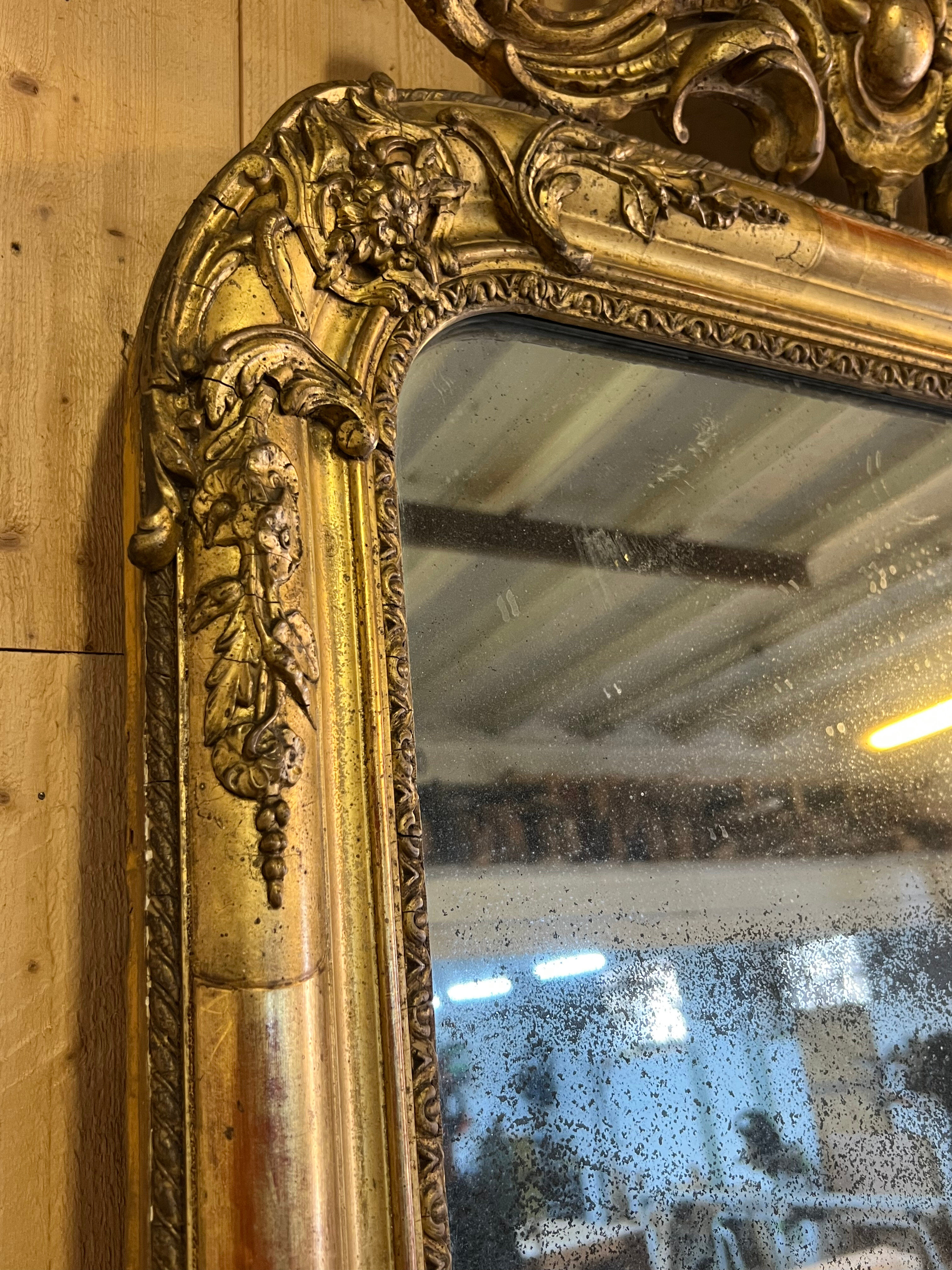Louis Philippe mirror with a mercury pediment