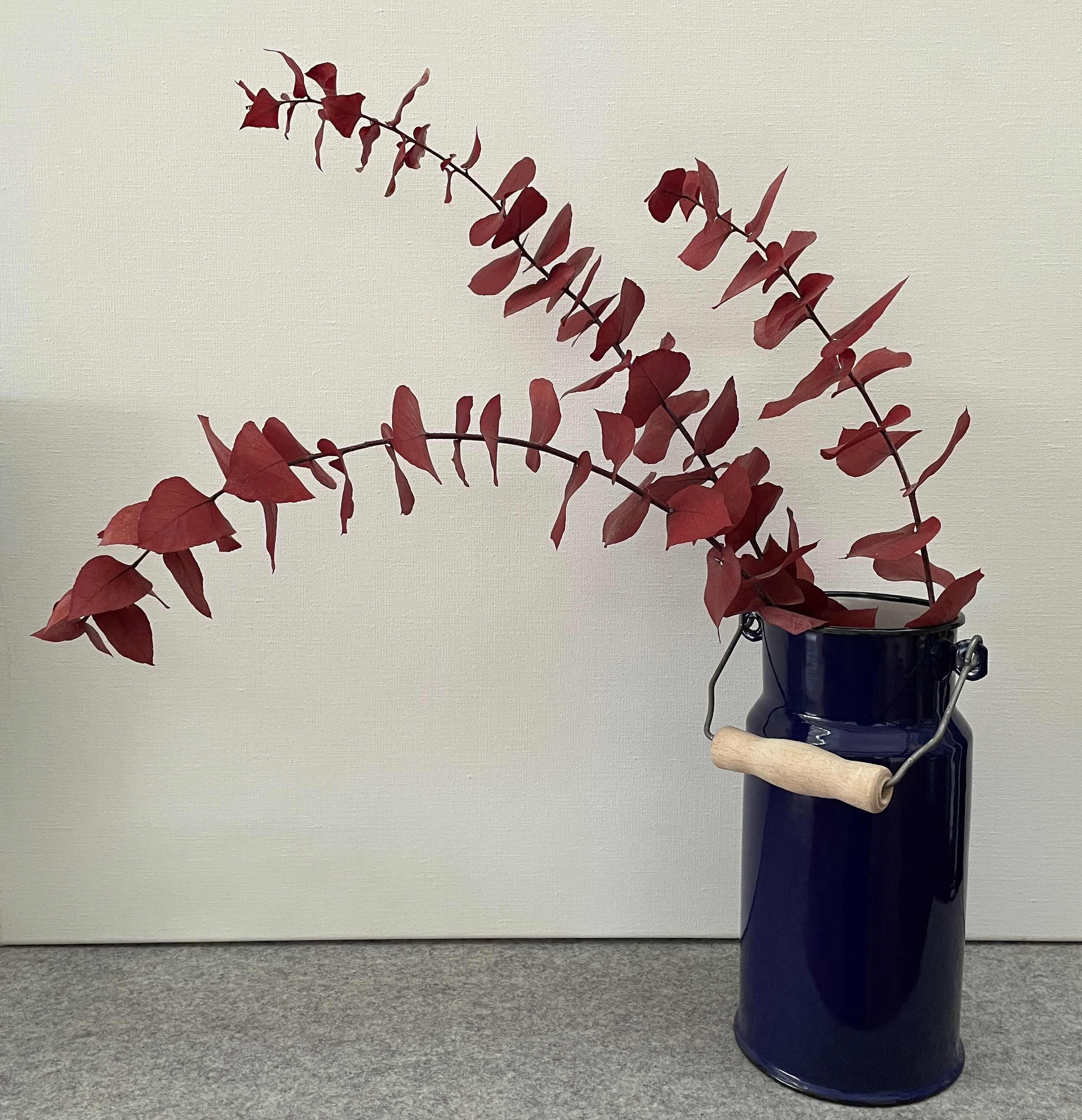 Blue enamelled milk jug