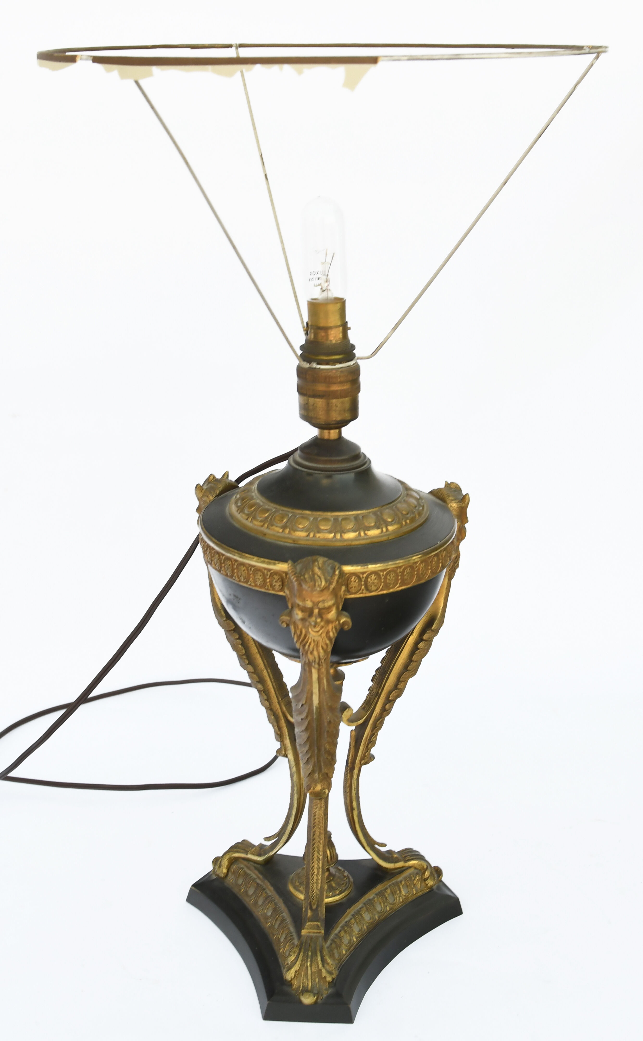 Lamp in gilded bronze and black lacquered metal