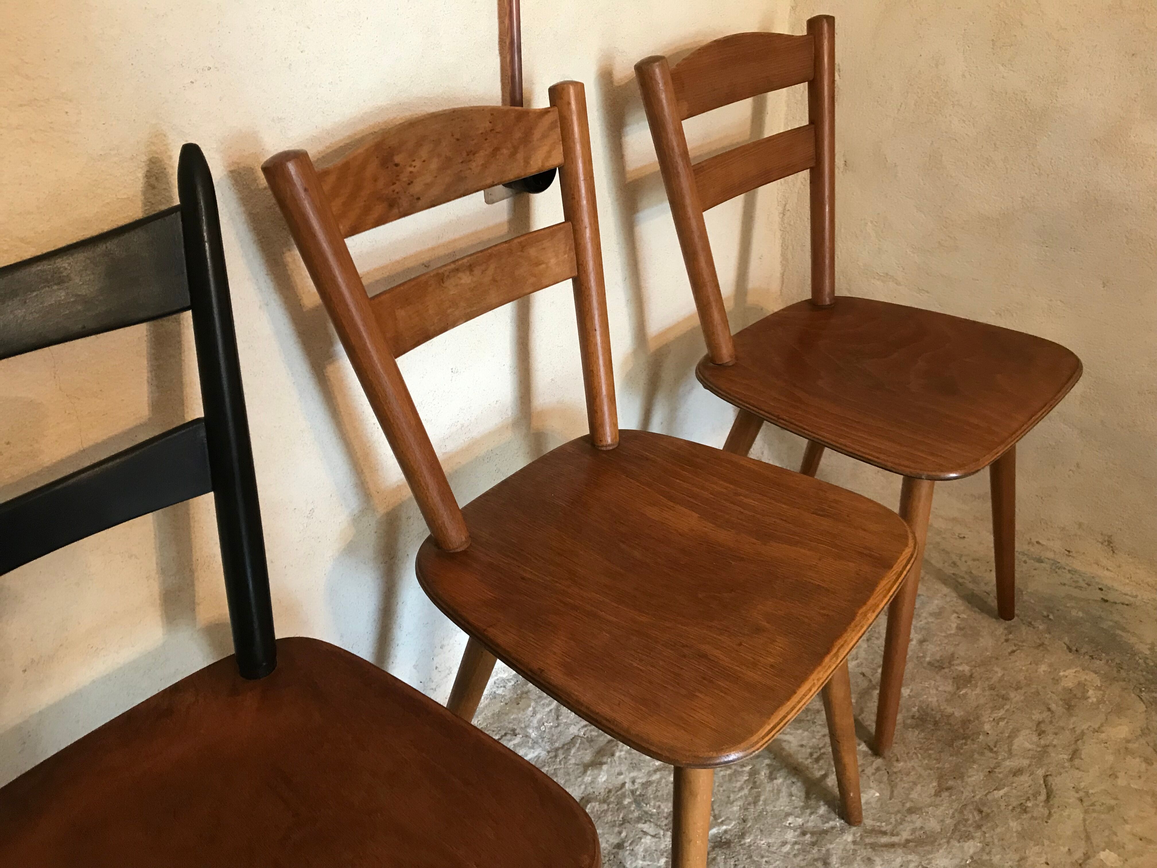 Set of 4 mismatched vintage chairs compass legs