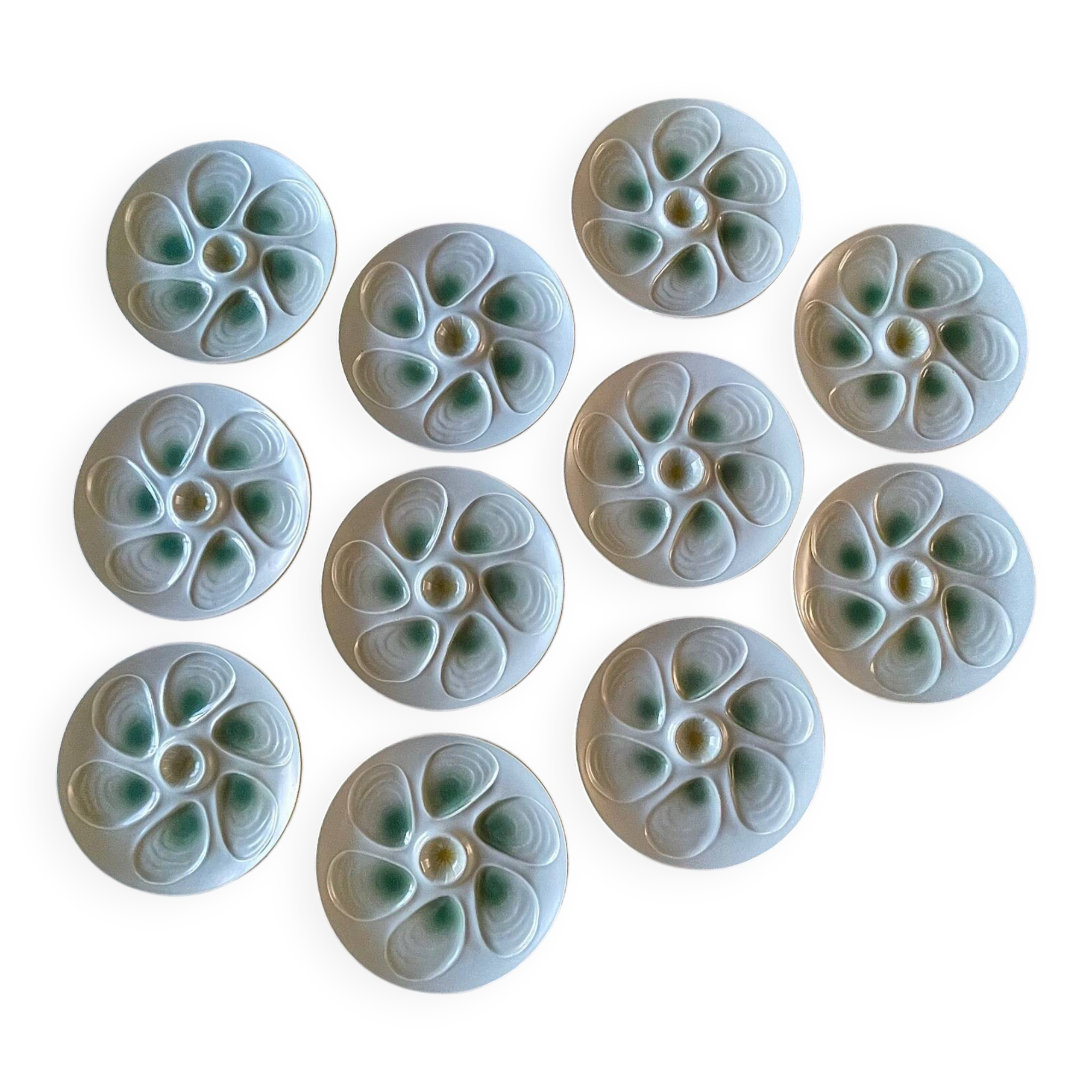 11 oyster plates 1960.