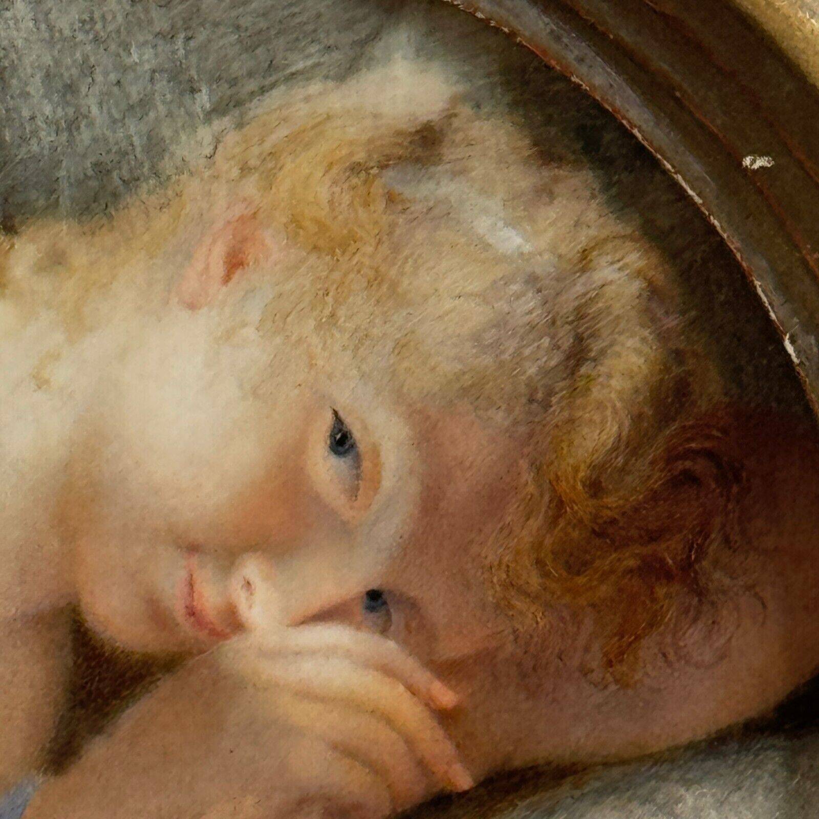 19th century miniature of a young girl with her head resting on a cushion
