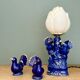 Vintage blue ceramic lamp with its birds.