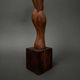 Carved wooden sculpture of a woman by Calin Hentea, 20th century