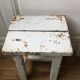 Stools, patinated wooden bedside tables