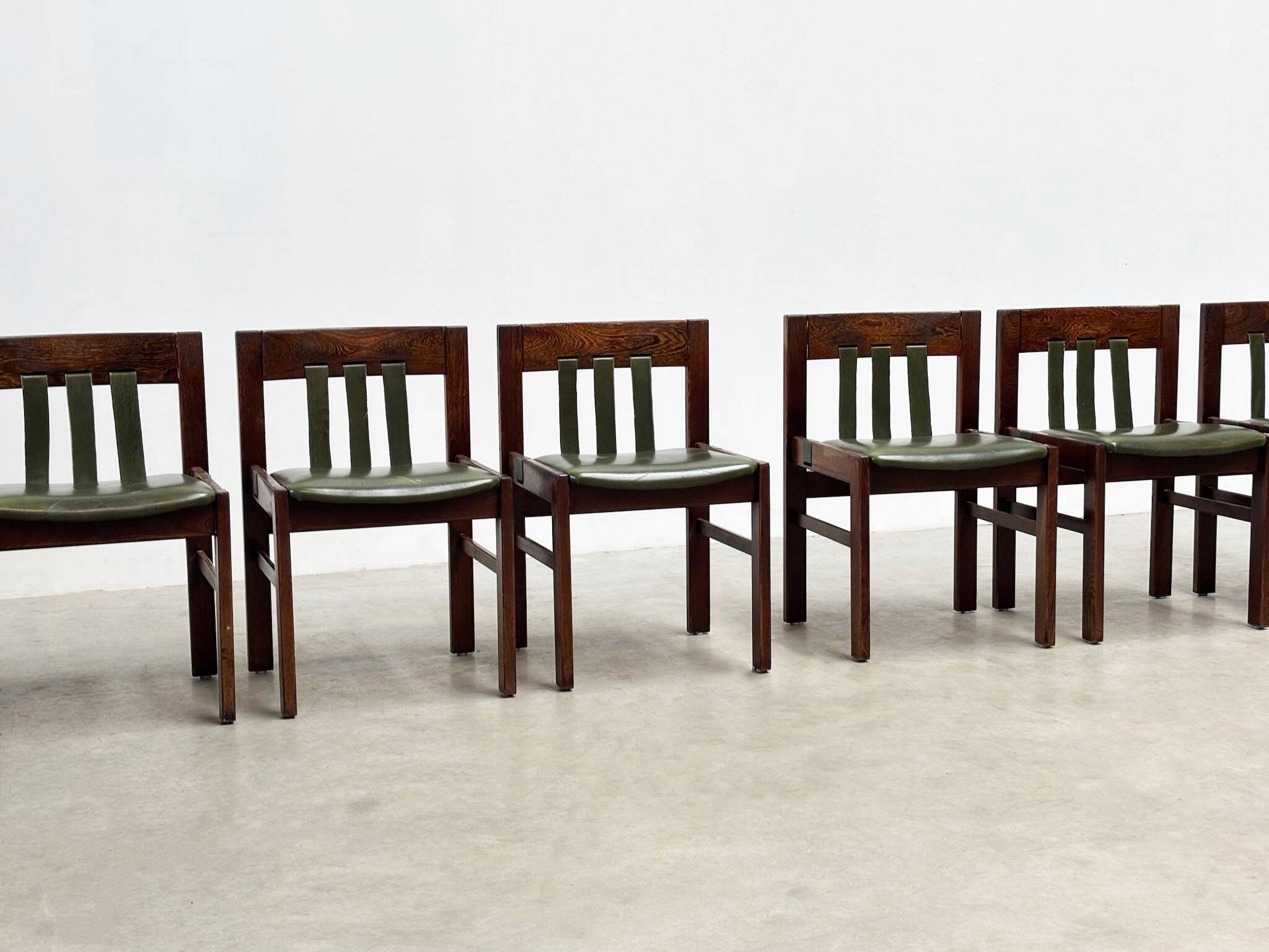 Green leather brutalist dining chairs