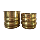Duo of brass pot covers