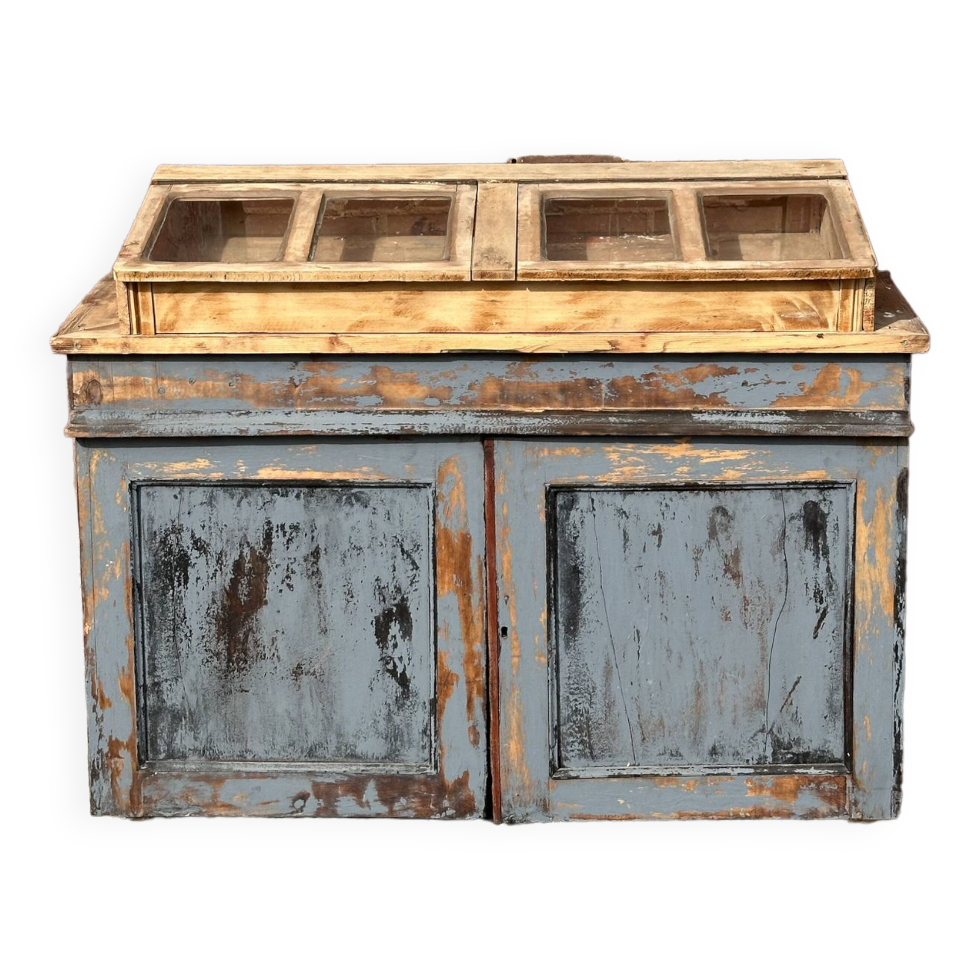 Showcase for boutique furniture, inclined boxes for presentation of collections on low sideboard