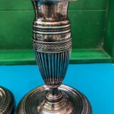 Pair of Louis XVI style candlesticks in silvered bronze