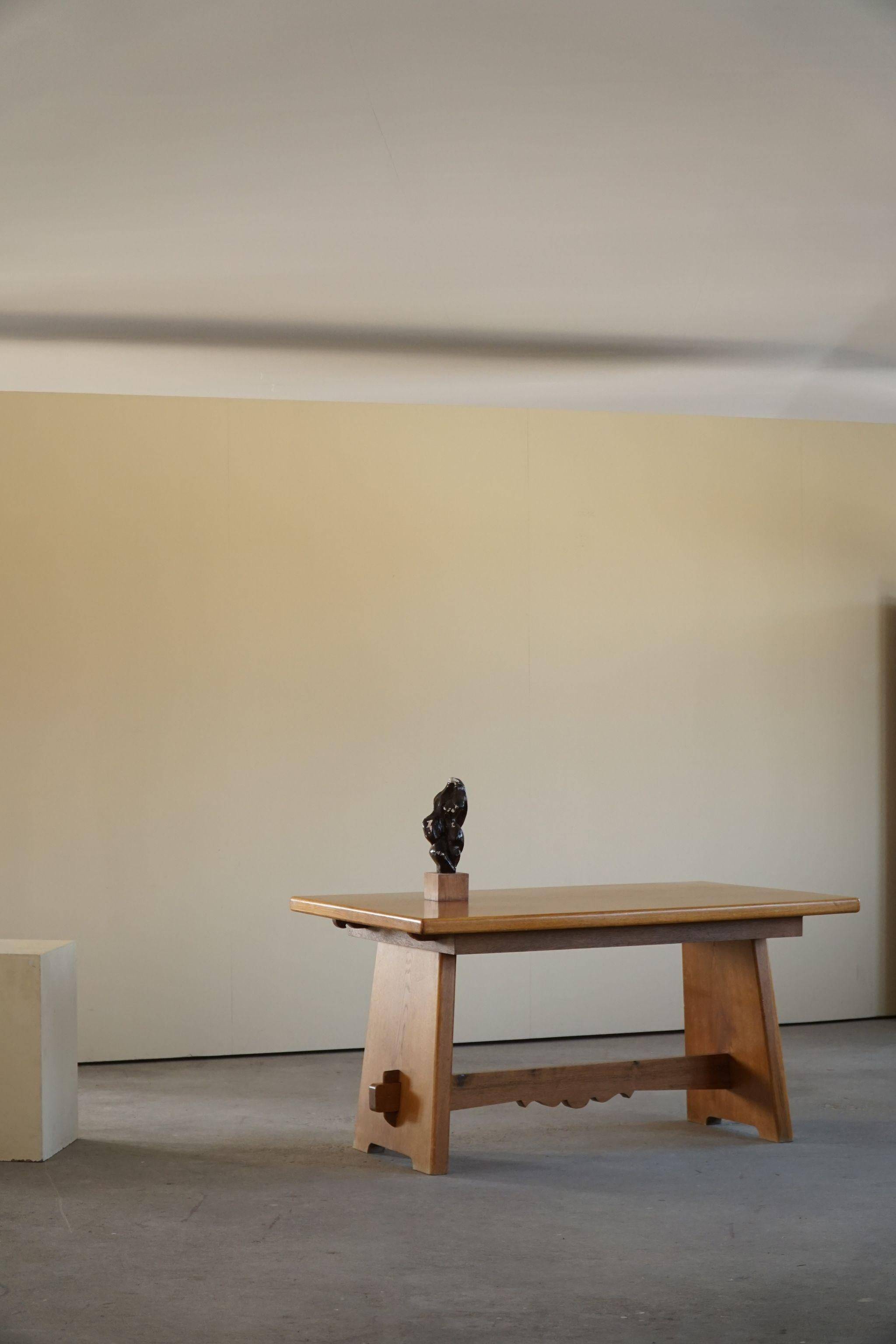 Mid-century brutalist dining table, made of oak, Danish craftsmanship, 1950s.