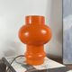 Lampe de table globe en verre opaline orange