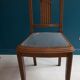 Secretary's office with an art deco chair