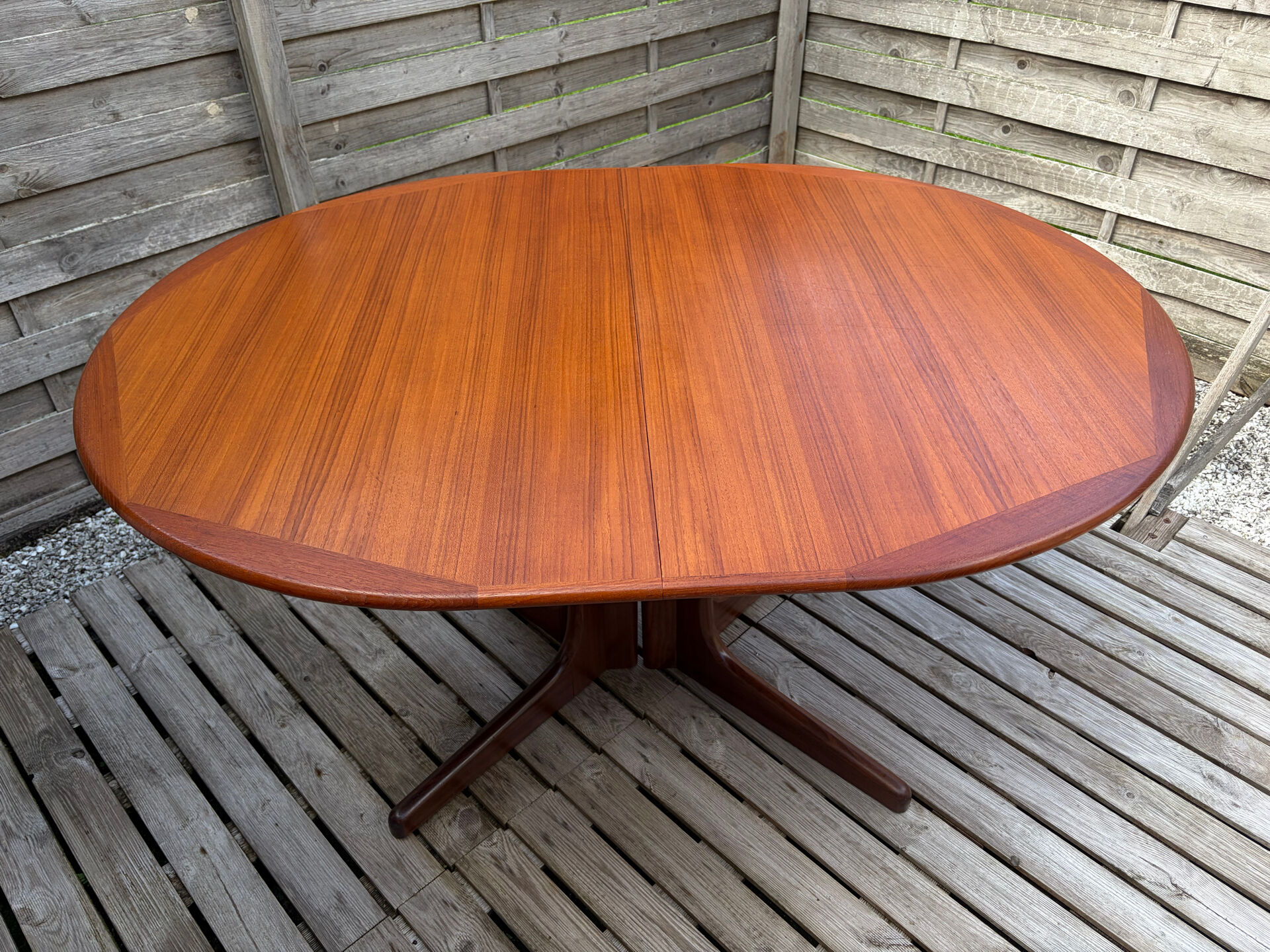 Oval teak table extendable with two leaves, Baumann style.