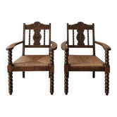 Pair of rustic wooden and straw armchairs