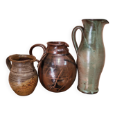 Set of three vintage ceramic jugs and a pitcher.