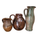 Set of three vintage ceramic jugs and a pitcher.