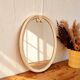 Grand miroir ovale vintage en métal émaillé blanc