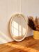 Grand miroir ovale vintage en métal émaillé blanc