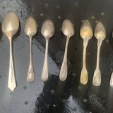 Set of 9 mismatched small spoons in silver metal, 7 small and two medium, art deco