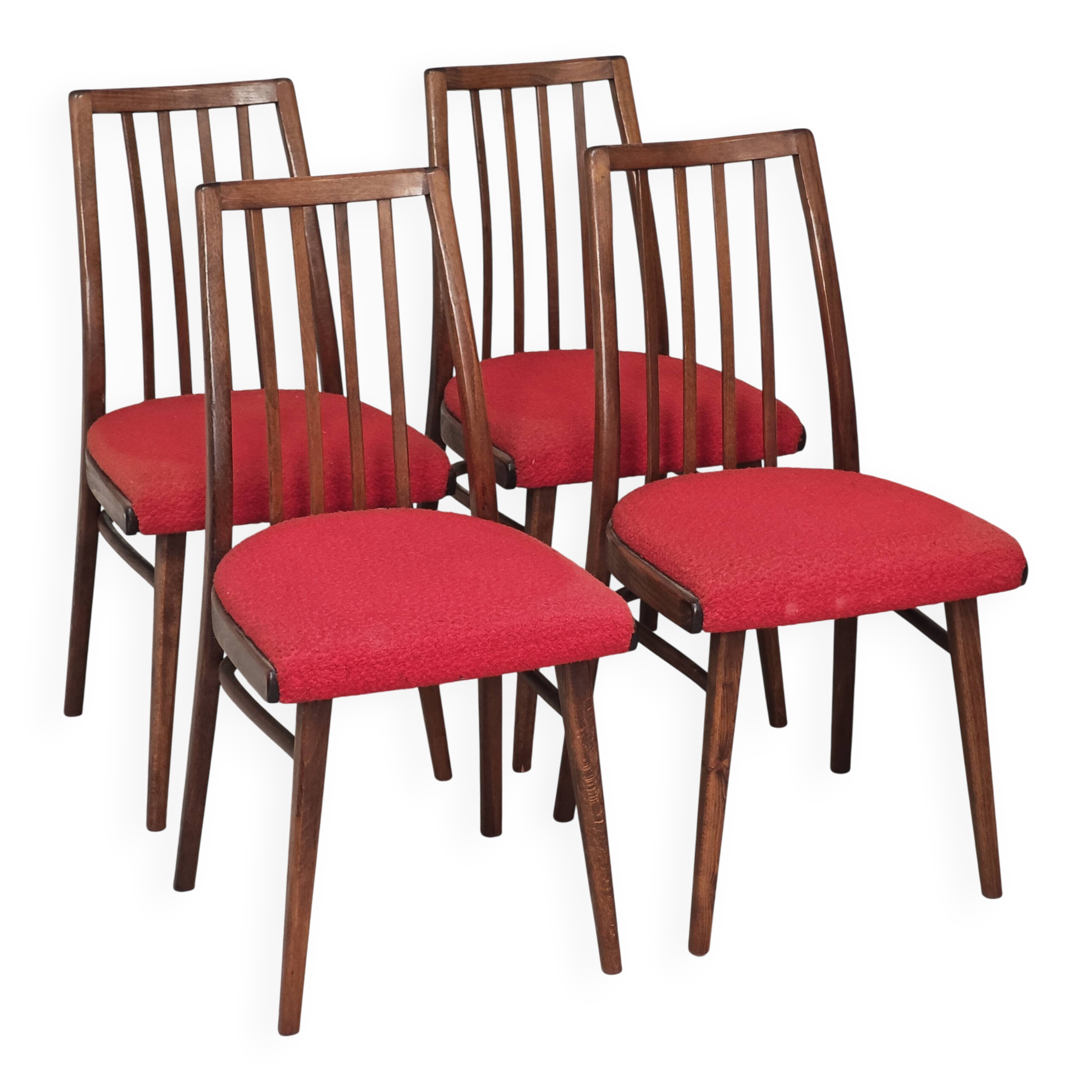 Set of 4 red dining chairs by Antonin Suman for Interier Praha.