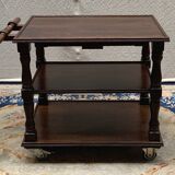 Service trolley with sliding tray.