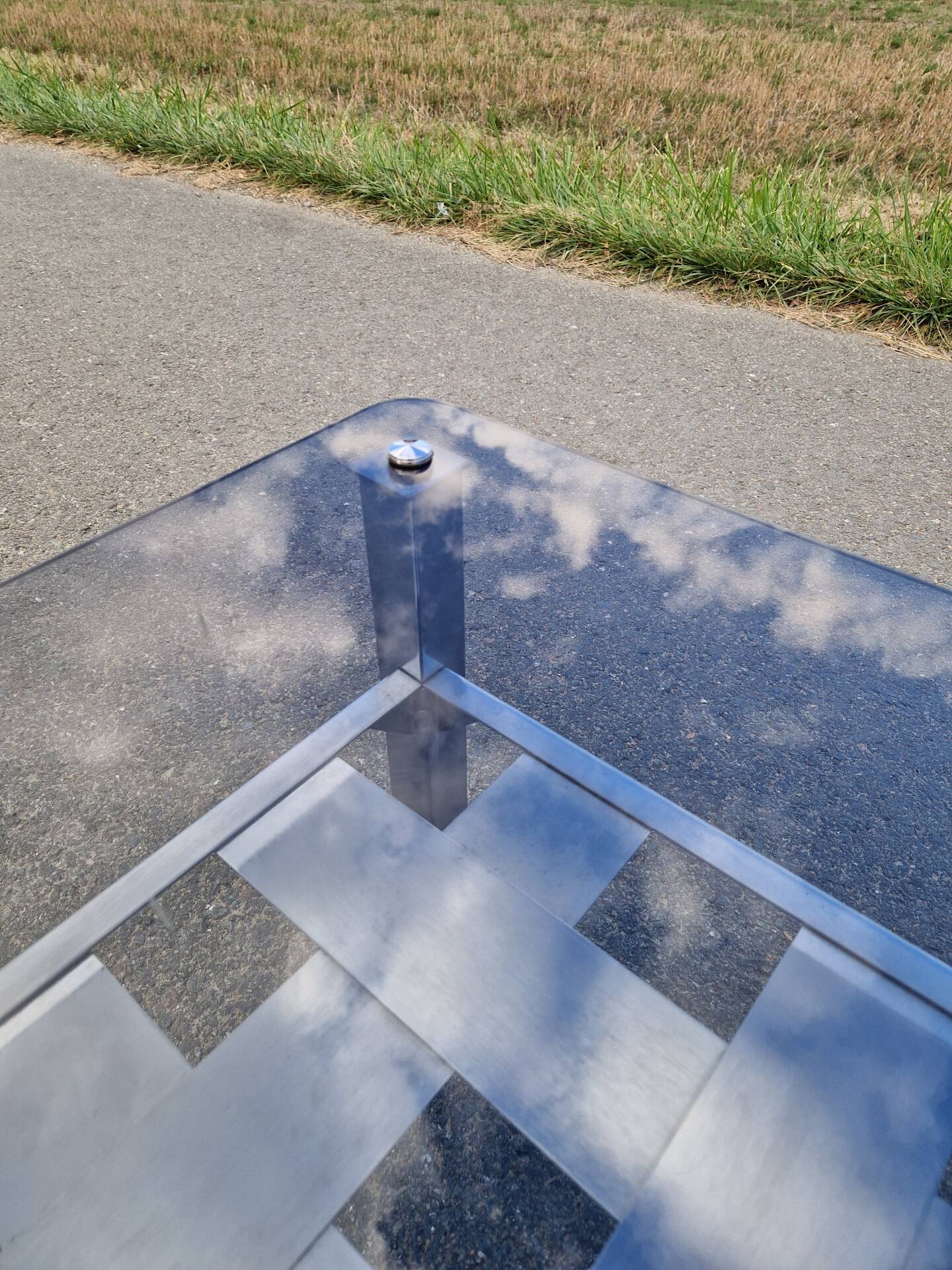 Stainless steel and smoked glass coffee table
