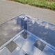 Stainless steel and smoked glass coffee table