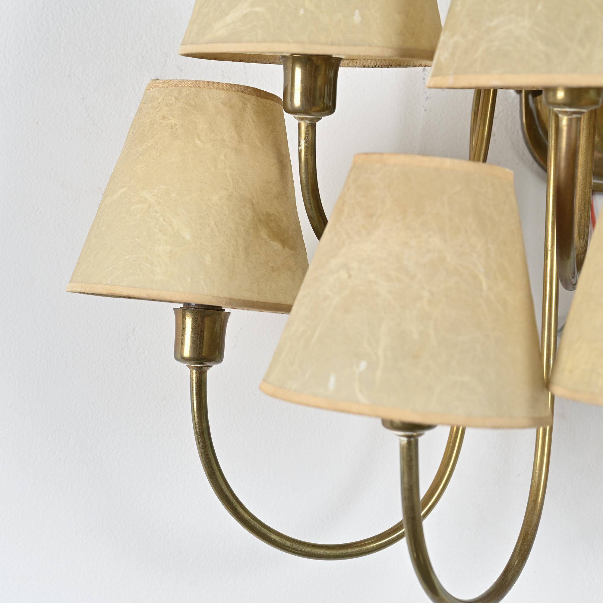 Wall sconce with nine arms in brass, France, circa 1950.