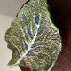 Vintage ceramic leaf-shaped vide poche, signed.