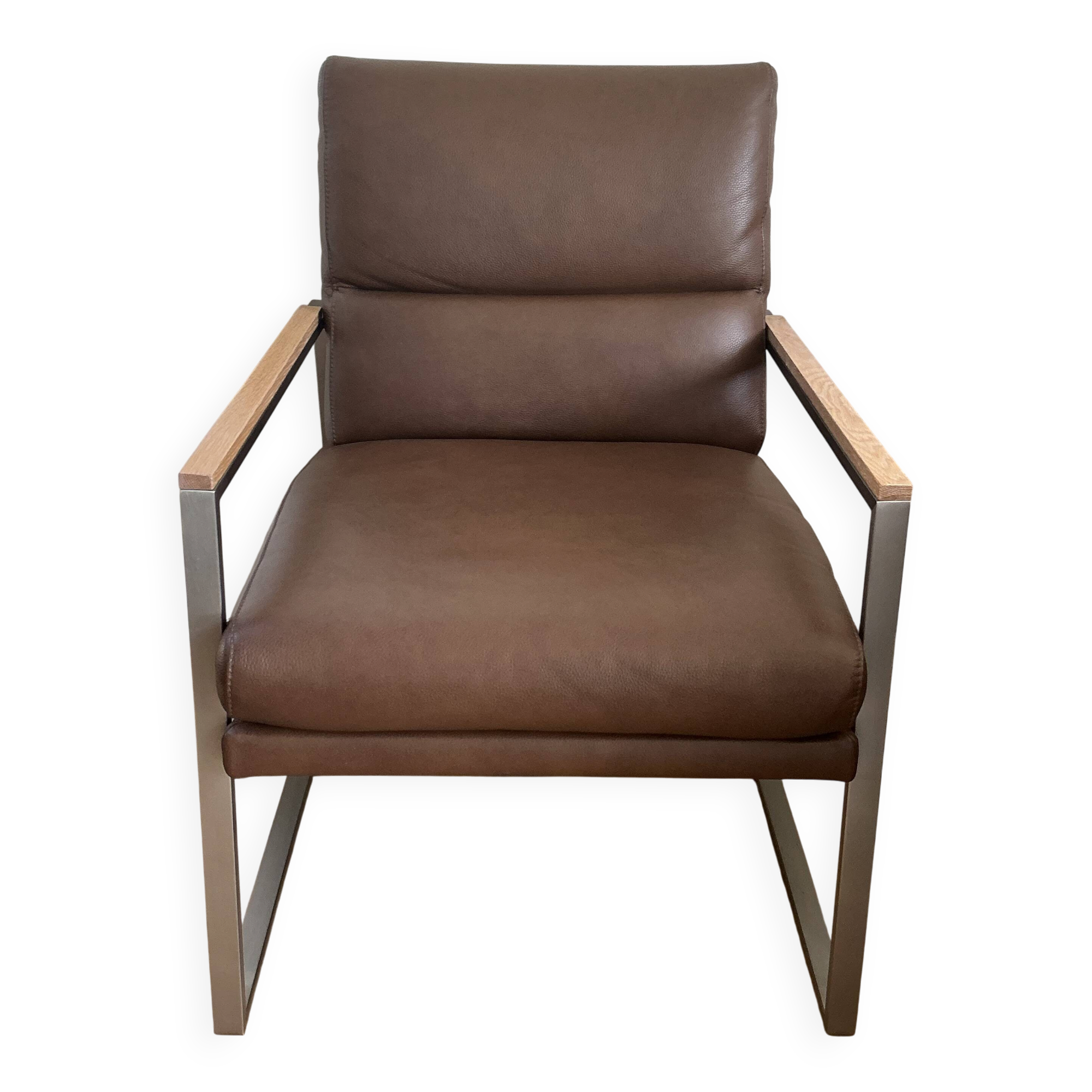 A pair genuine leather armchairs.