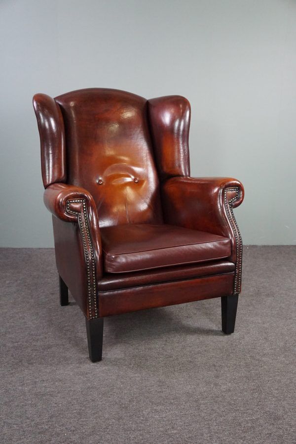 Patinated sheepskin armchair