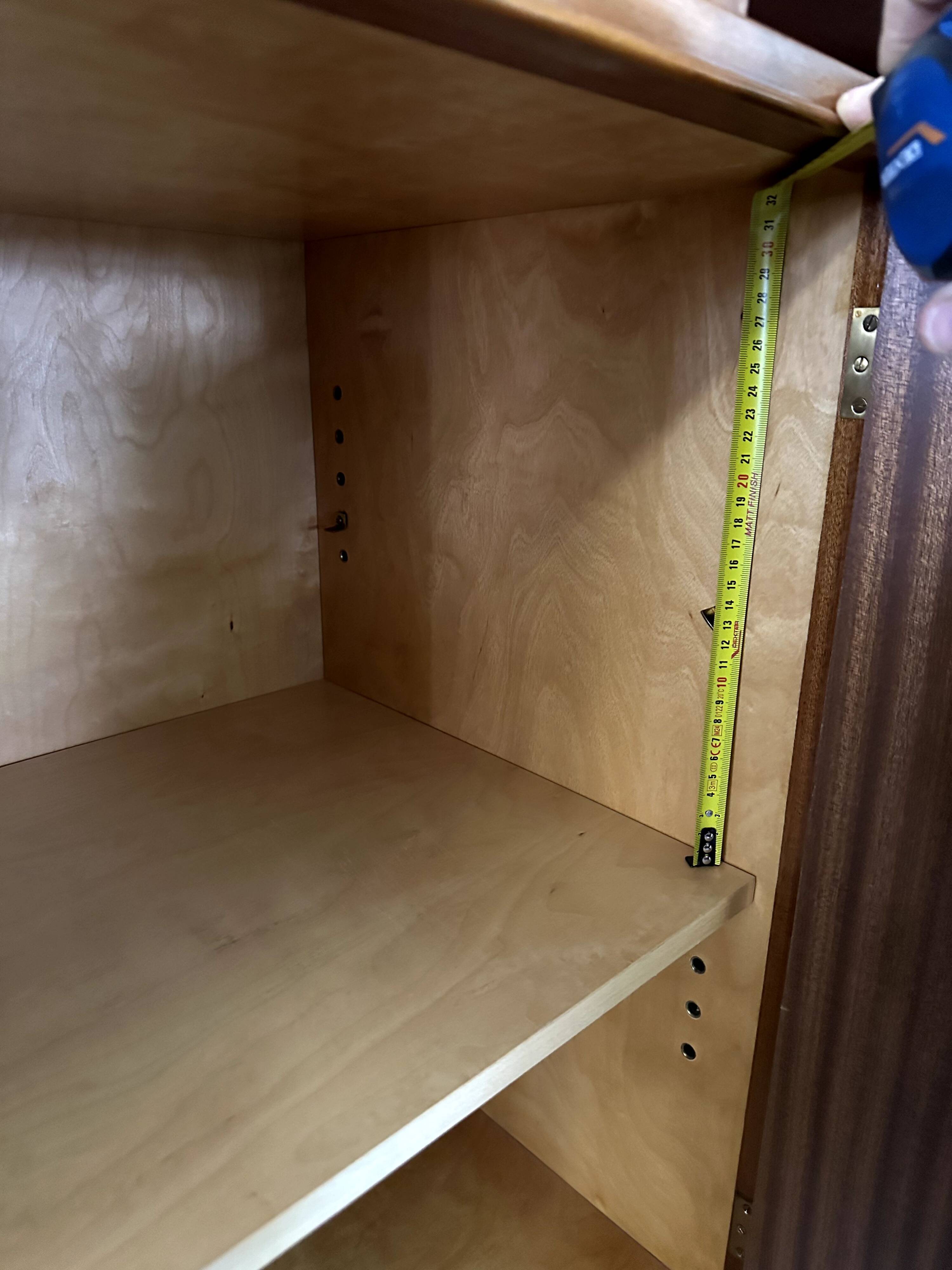 Scandinavian high sideboard with central drawers