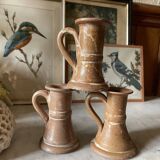 Trio of stoneware candle holders