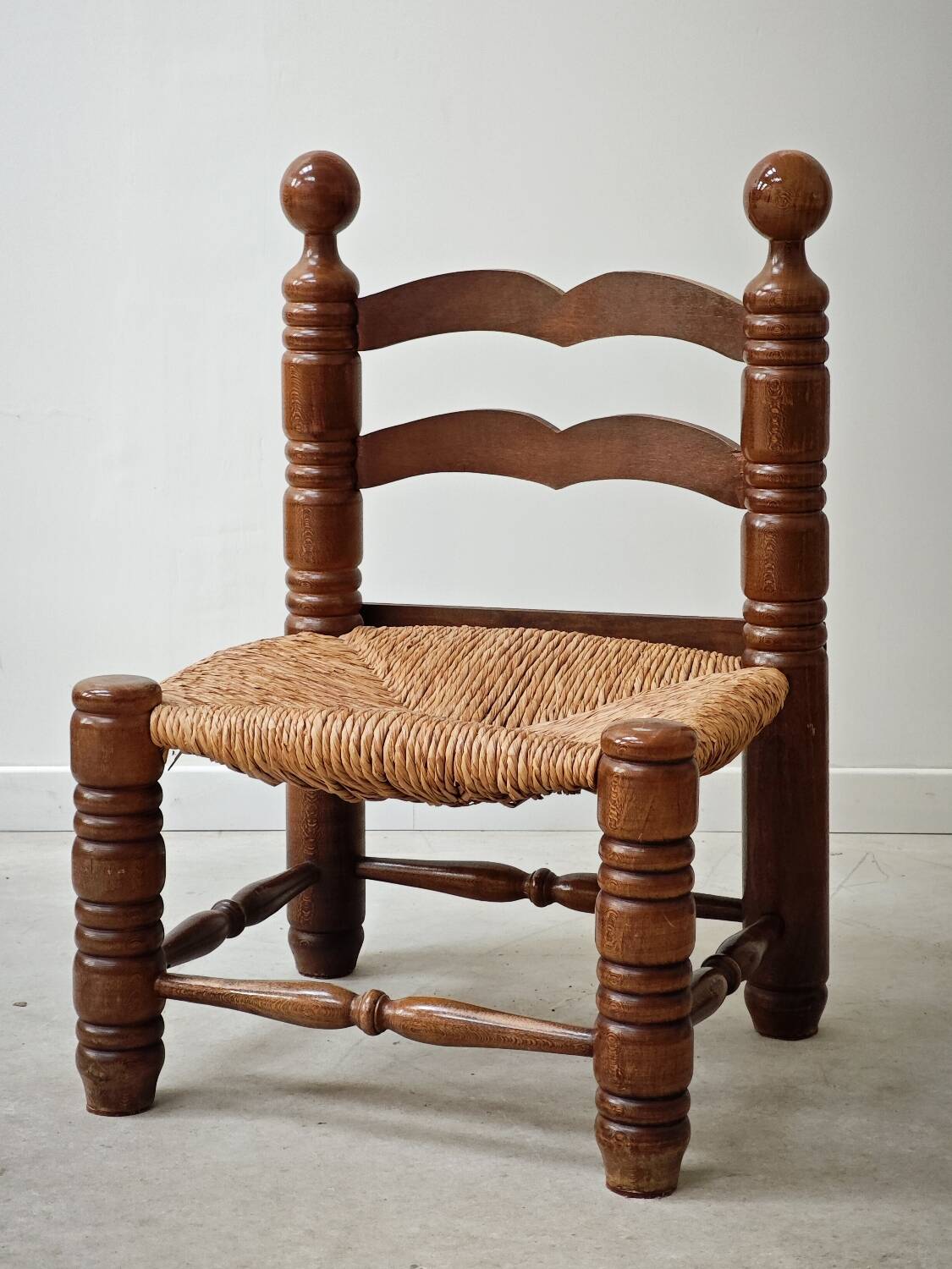 Small Charles Dudouyt chair in wood and straw