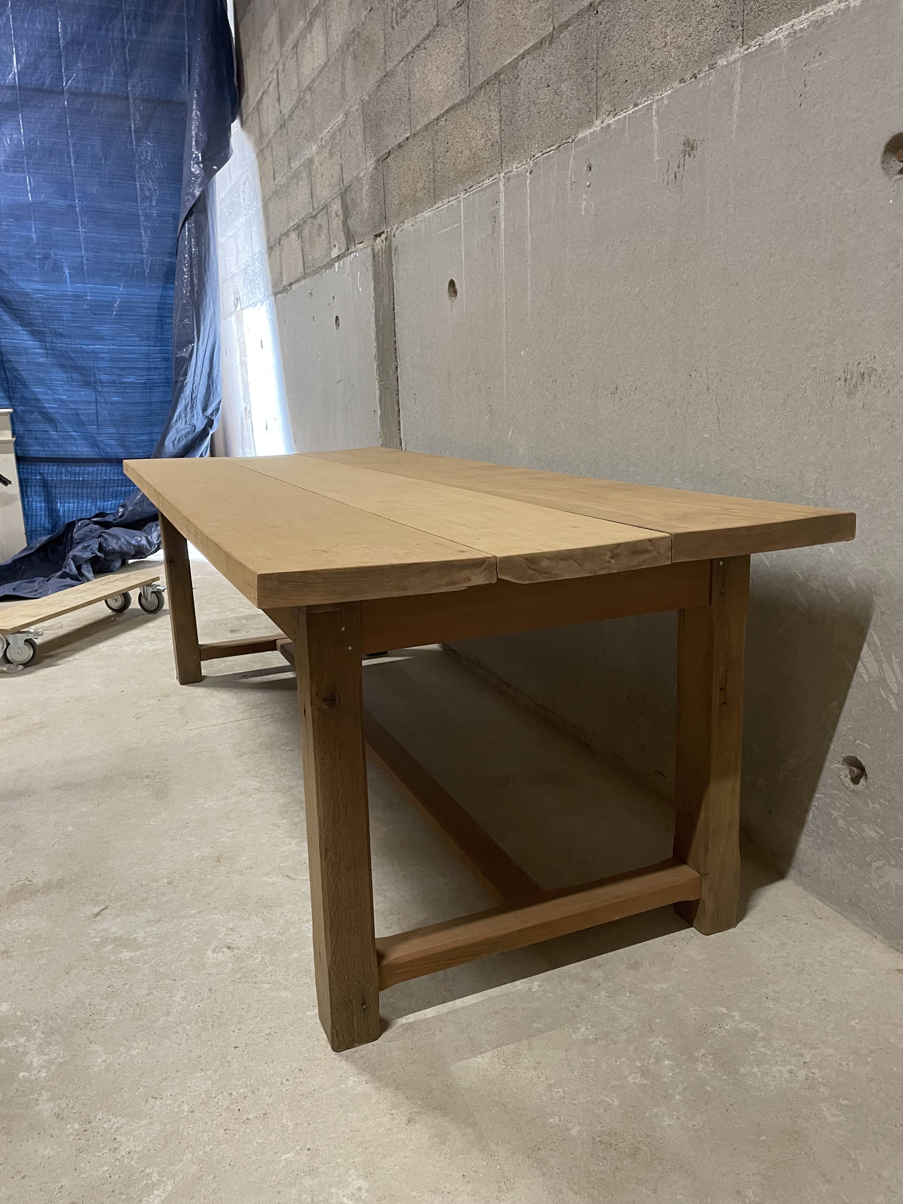 Large convivial solid wood table – ideal for big gatherings.