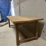 Large convivial solid wood table – ideal for big gatherings.
