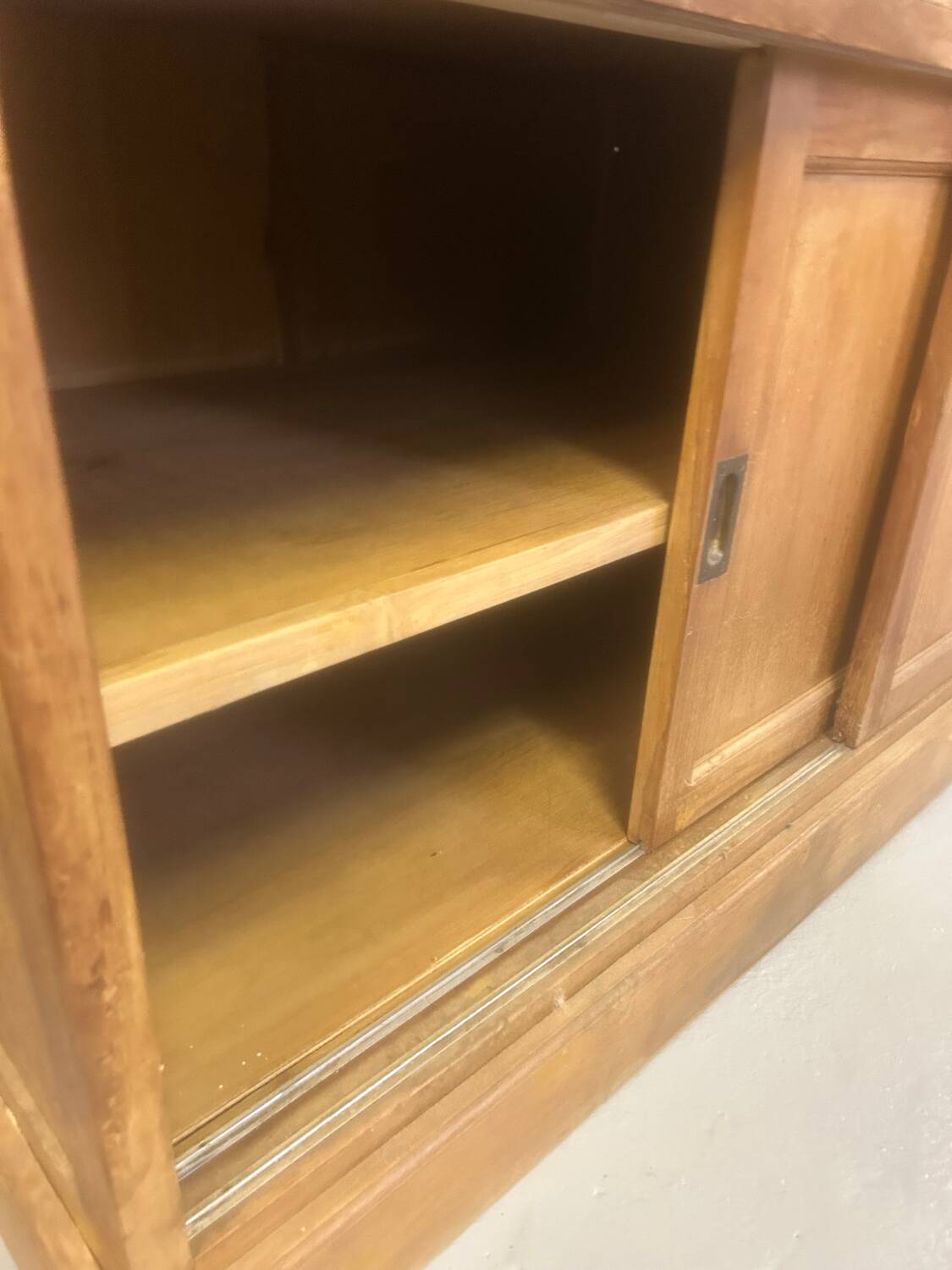 Large antique haberdashery cabinet with glass doors.