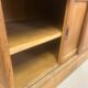 Large antique haberdashery cabinet with glass doors.