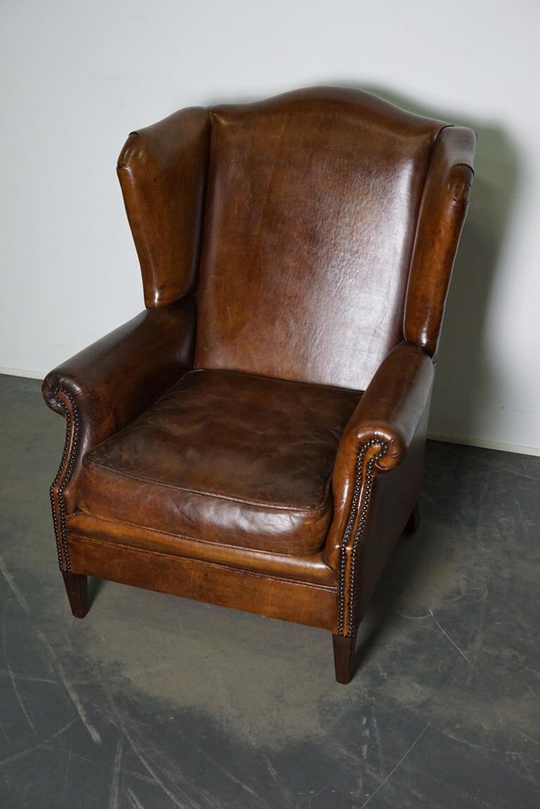 Fauteuil club vintage en cuir de couleur cognac Pays-Bas