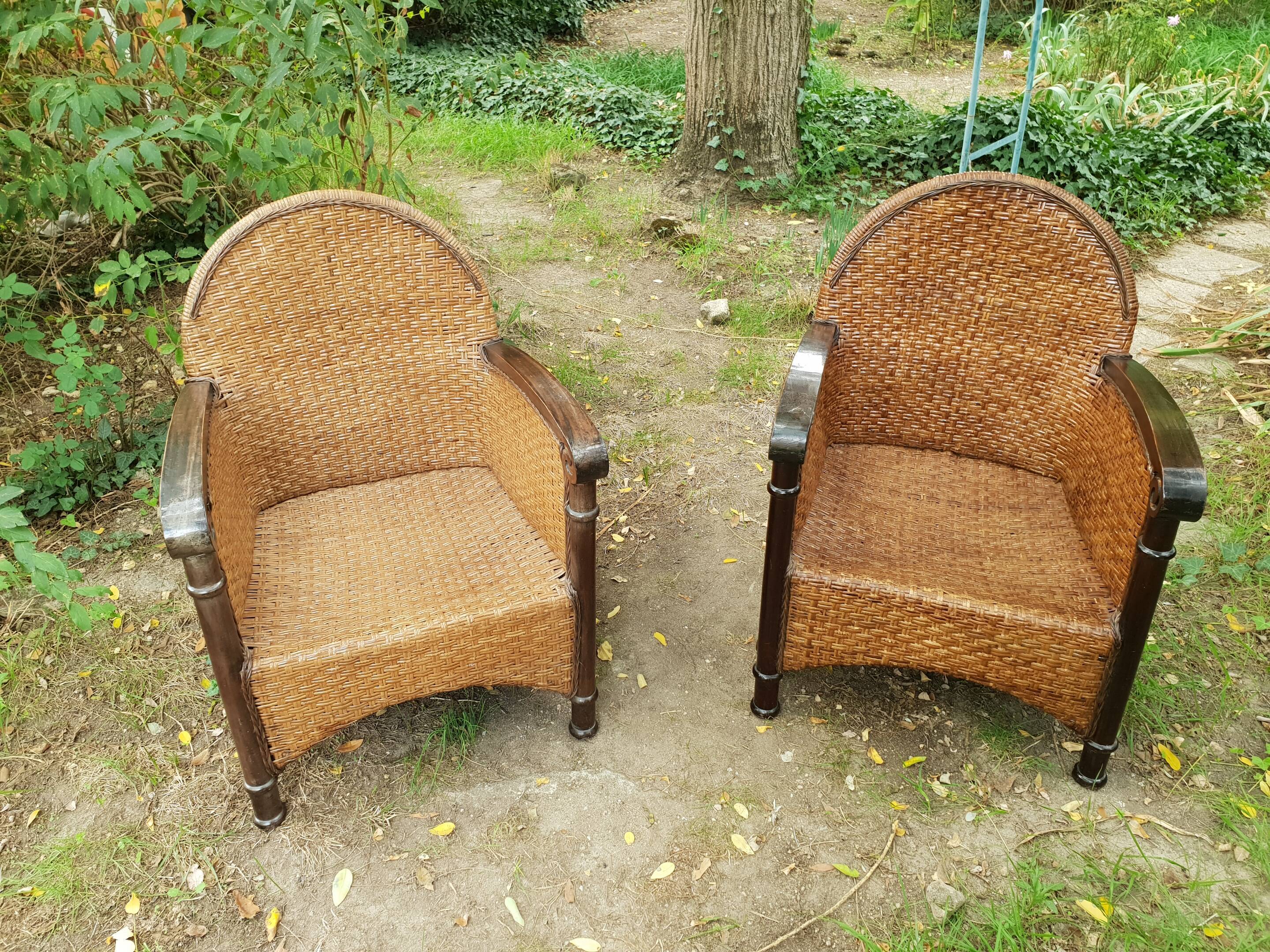 Paire de fauteuils en bois et rotin 1980